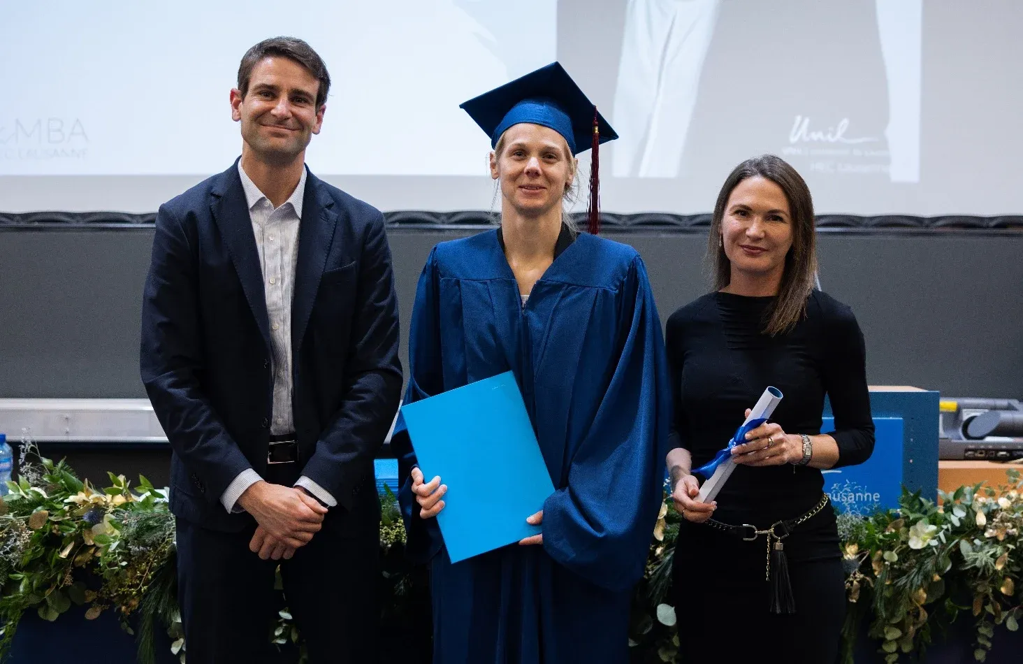 Nathalie Brandenberg receiving her award at the EMBA 2022 graduation ceremony