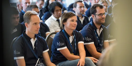 EMBA participants listening to a presentation during the introduction week