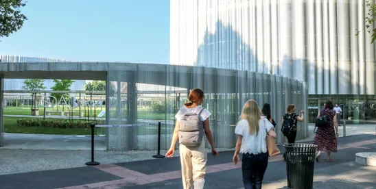 EMBA participants walking on the SDA Bocconi campus in Milan